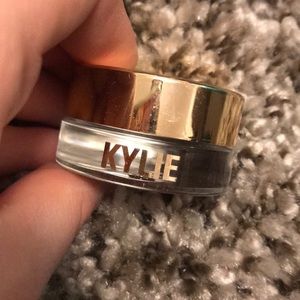 Kylie Cosmetics rose gold creme eyeshadow.